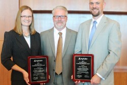 Last year’s recipients of the Dr. Bruce Wren award were Dr. Sarah Giebel (Dairy) and Dr. Holt Tripp (Beef). Pictured at center is Dr. Robert Rust, with sponsoring company AgriLabs. 