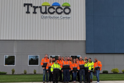 The Trucco team celebrates the new kiwifruit facility in Vineland, N.J.