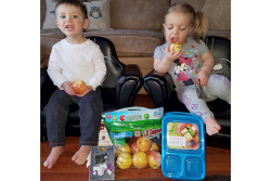 Winners of Stemilt Growers' Snappiest Lil Snapper contest enjoy their prizes.