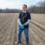 Courtesy Mike Pirrone Produce Inc. Matt DeBlouw, president of Mike Pirrone Produce, checks out a kale field. He expects a strong year for kale and the company’s other crops.
