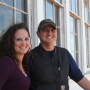 Flanked by the 1928 schoolhouse, Aaron is the face of Base Vines & Cattle side-stream ventures and Jennifer is the logistical captain.