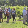 People gather for the annual Ohio Produce Growers & Marketers Association summer tour