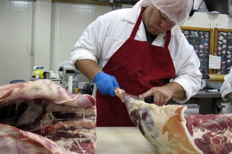 Small butcher plant worker