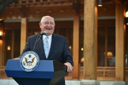 During a panel discussion with Rep. Collin Peterson (D-Minn.) at FarmFest, a rural Minnesota fair, Agriculture Secretary Sonny Perdue tried to smooth over the angst in the room with a joke. 