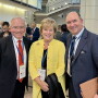 Three individuals stand together: FMI President and CEO Leslie Sarasin at the White House Conference. She is joined by Kroger CEO Rodney McMullen (left) and Hy-Vee Chairman Randy Edeker (right)