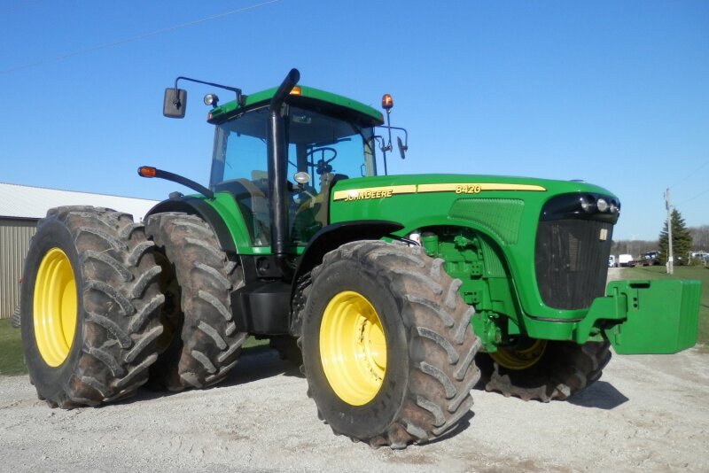 This 2002 John Deere 8420 sold on a May 4 farm auction in DePere, WI.
