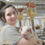 Lidia Williams holding piglet