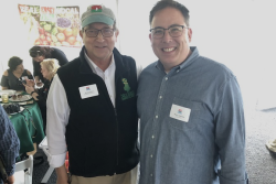New Jersey secretary of agriculture Douglas Fisher and Marc Oshima, cofounder and chief marketing officer of AeroFarms, Newark, N.J., attend the May Eastern Produce Council barbecue dinner meeting.