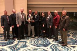 The NPC executive search committee receives The Packer’s 2019 Potato Men and Women for All Seasons Award on Jan. 16 from Packer Editor Tom Karst (center).
