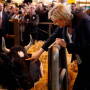 French far-right leader Marine le Pen touches the cow Fine, symbol of the 2017 Agriculture Fair, Tuesday, Feb. 28, 2017 in Paris.  Read more here: http://www.sacbee.com/news/business/article135397304.html#storylink=cpy