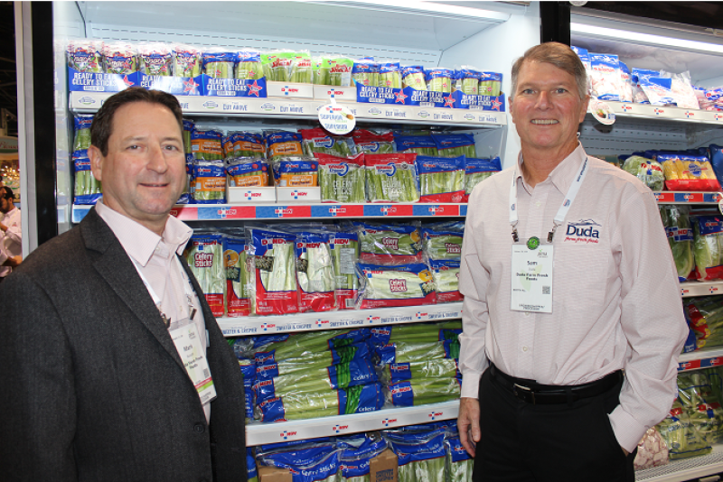Mark Bassetti (left), senior vice president of sales and marketing, and Sam Duda, senior vice president of national operations, told booth visitors how Oviedo, Fla.-based Duda Farm Fresh Foods has expanded its cooling and fresh-cut facility in Oxnard, Calif.