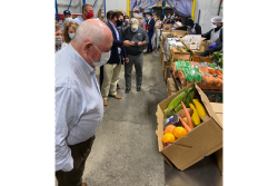 Agriculture Secretary Sonny Perdue surveys a produce box for the USDA's Farmers to Families Food Box Program in 2020. Immediately after the COVID-19 pandemic began, the USDA's Farmers to Families Food Box Program spent billions on sourcing fresh produce and other food for food banks and other outlets. USDA expenditures on produce boxes have dropped dramatically in the last year under The Emergency Food Assistance Program.
