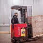 A worker loads product at Co-op Partners Warehouse. Melons, locally grown cucumbers and bell peppers and some late corn will be among the wholesale distributor’s products for late summer, says Tom Rodmyre, warehouse director.