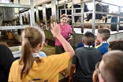 Ohio dairy farmer Brenda Hastings answers a question from a student visiting her dairy farm as part of the Fuel Up to Play 60 Student Ambassador Summit.