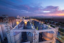 Feedmill Grain Bins Sunset_Adobe Stock