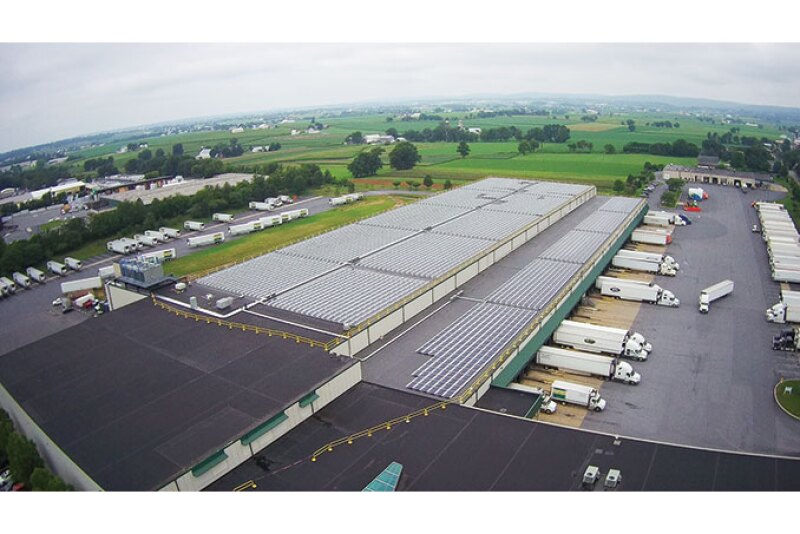Four Seasons Produce Inc. installed an array of 3,900 solar panels on the company’s warehouse roof. Nelson Longenecker, vice
president of business innovation, says the solar panel array will pay for itself in less than three years and produces 1.3 megawatts of
energy during peak daylight hours.