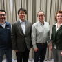 L to R: Edison Magalhaes, Jianqiang Zhang and Cesar Corzo with Lisa Tokach at the AASV Annual Meeting in Atlanta, Ga. 