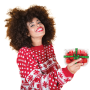 black woman in Christmas sweater holding recycled package of tomatoes