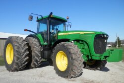 This 2002 John Deere 8420 sold on a May 4 farm auction in DePere, WI.