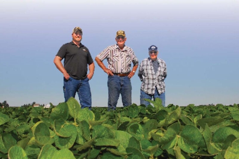 Three generations of Uphoffs, from left: Philip, John and Paul, raise continuous soybeans in north-central Illinois.