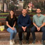 L.G. Herndon Jr. Farms and Gary Sinise Foundation representatives sit on the bench featured in the movie, “Forrest Gump.” 