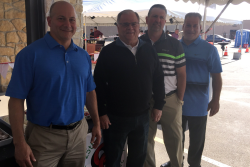 C&C Produce owners Nick Conforti, Joe Cali and John Conforti, entertain Gary Flosi of Miracle Transportation (2nd from left) at C&C’s 25th anniversary celebration May 4.