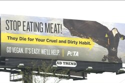 A billboard from People for the Ethical Treatment of Animals (PETA) doesn't appear to be meeting the animal rights group's goals of pushing people to a vegan diet after being installed in Kansas City, Missouri. 