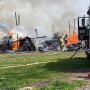 Firefighter fighting barn fire