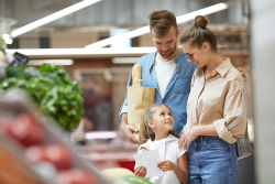 family shopping in produce section