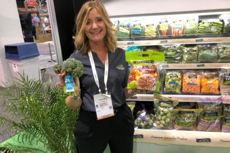  Jennifer Rigdon, business development manager for Southern Specialties, Pompano Beach, Fla., displays new product offerings at Produce Marketing Association's Fresh Summit expo.