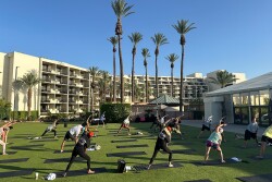 West Coast Produce Expo kicked off with yoga under the palm trees