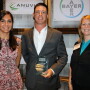 Cody Goodknight, a Chattanooga, Okla., cattle producer and row-crop farmer, accepts the 2017 Tomorrow’s Top Producer Horizon Award from DuPont Pioneer Marketing Communications Manager Katie Meyer (left) and Top Producer Editor Sara Schafer.
