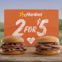 In a unique advertising campaign, an iconic American fast-food restaurant plans to keep its sandwiches veggie-free, but will help plant 10 million vegetables in community gardens.