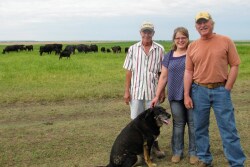 Terry, left, DenaMarie and Wayne Springer are pushing toward open-pollinating corn and direct-to-consumer beef.