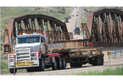 100-year-old bridge is moved along Highway 16 in Washakie County, Wyo.