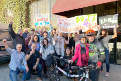 Employees of Paramount Export support  Ed and Robyn Purves, who are 
riding tandem in their fifth Tour de Fresh to raise money for salad bars and celebrate the company's 80th anniversary.