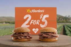 In a unique advertising campaign, an iconic American fast-food restaurant plans to keep its sandwiches veggie-free, but will help plant 10 million vegetables in community gardens.