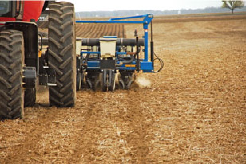 Tractor applying nitrogen to boost yields
