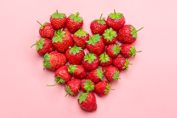 Strawberries arranged in shape of heart