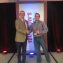 Mark Timke, national strategic account manager for Pioneer (left), congratulates Anthony Schwarck of Schwarck Farms in Riceville, Iowa, for being named the 2019 Tomorrow’s Top Producer Horizon Award winner at Farm Journal Media’s Top Producer Seminar in Chicago.