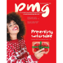 black woman in winter sweater holding tomato clamshell