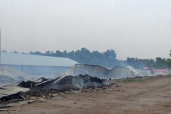 A burned down farm building.
