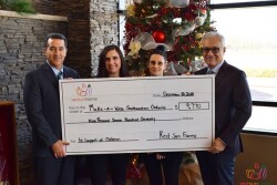 Left to Right (Carlos Visconti, CEO USA and Canada Operations Red Sun Farms; Katherine Melanson, Coordinator Make-A-Wish Southwestern Ontario; Liz Santos, Red Sun Farms; Jim DiMenna, President Red Sun Farms

