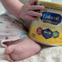 Formula can with baby