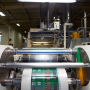 Machine printing roll stock for lettuce packaging