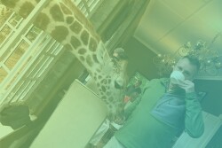 Kevin Moffitt, president and CEO of Pear Bureau Northwest, pictured here with a giraffe on his world travels, shares the opportunity the produce industry should take advantage of, his most memorable project and what new skill we should try.