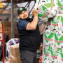 Manuel Orozco, co-owner with his brother, Luis, of Arcadios Produce Inc., fills an order at the company’s facility on the San Francisco Wholesale Produce Market. A multi-year project calls for replacing each of the original four buildings on the market, says Michael Janis, general manager.
