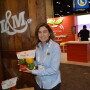  Lee Anne Oxford, director of marketing for L&M Farms, Raleigh, N.C., displays the firm’s Simply Sun Peppers.