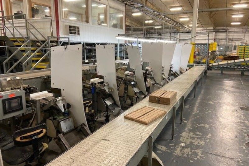 Gebbers Farms has barriers between workers in the packinghouse to prevent the spread of COVID-19.