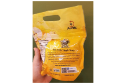 Arctic apple packaging includes a QR code link to a website describing how the apple was developed.